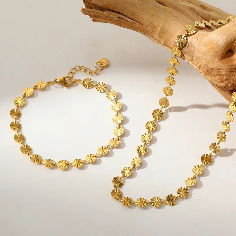 Solskive armbånd 18k forgyldt